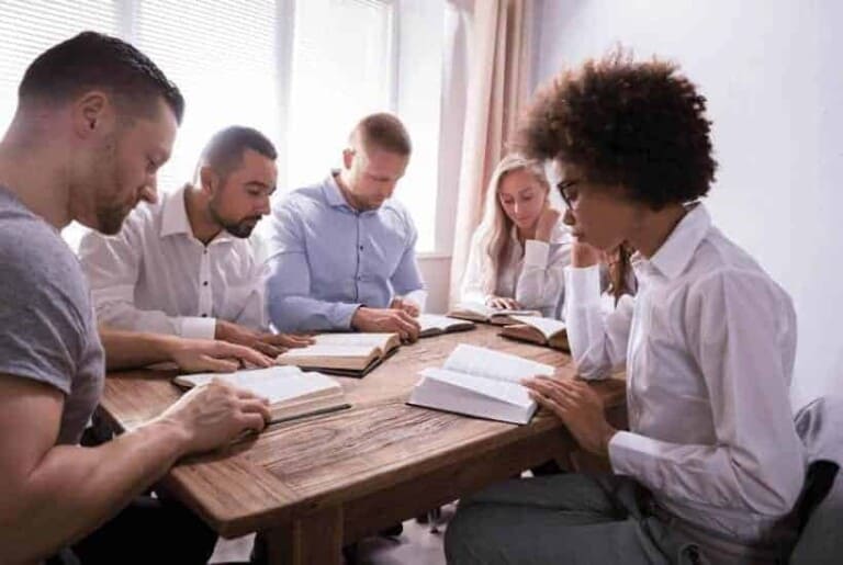 an image of a small group doing a bible study together featured image