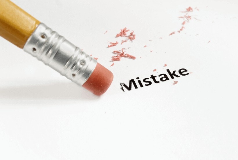 an image of a pencil and piece of paper with the word mistake being erased. featured image for Helpful Fixer Personality? 5 Important Things To Consider