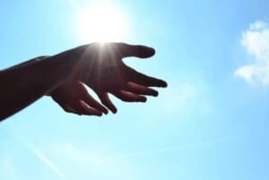 an image of a pair of hands reaching out from the sky. featured image for Make Treasured Memories One Inspiring Lesson You Can Learn