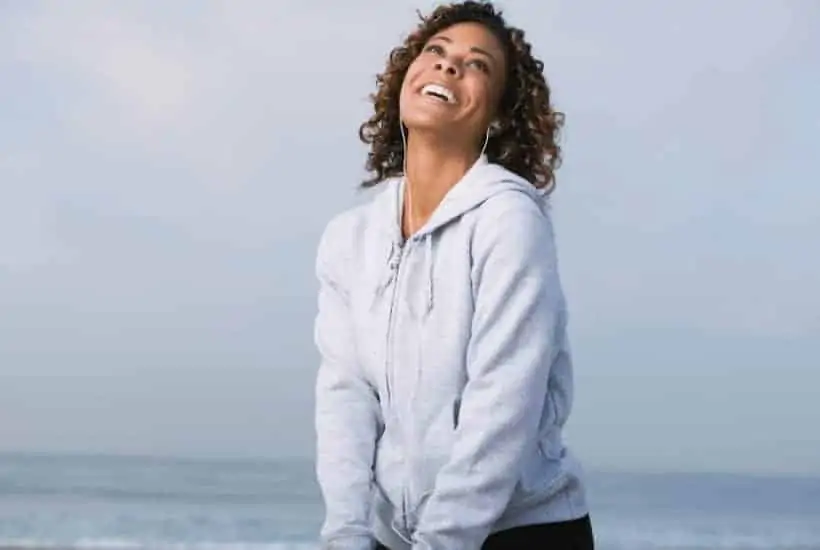 an image of a woman smiling looking towards the sky with text reading 30 Ways to Be Complete in Christ