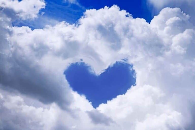 No Greater Love 50 Uplifting Bible Verses About God's Love For You - An image of the sky with a cloud formed in the shape of a heart