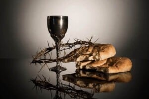 an image of crown of thorns, bread, and cup of wine
