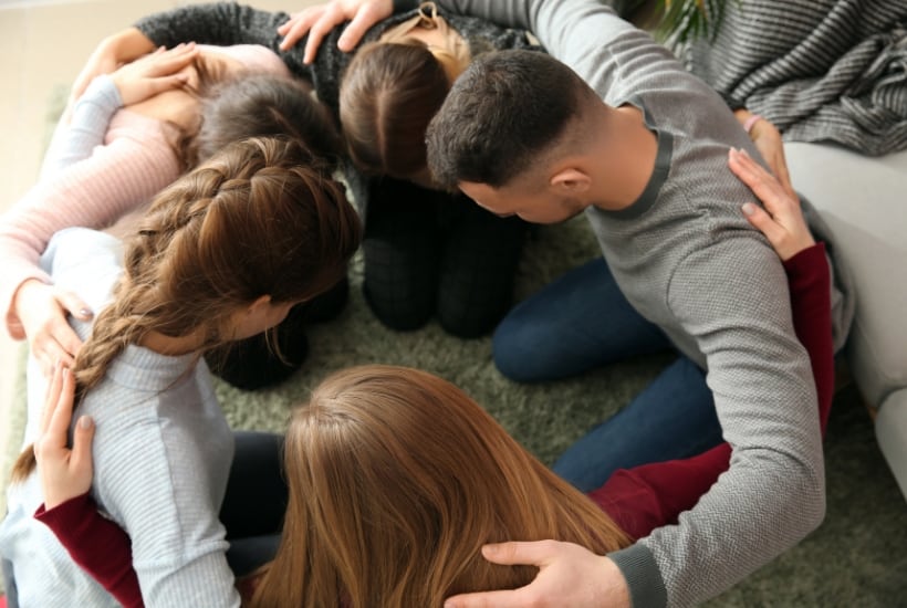People Praying in a group